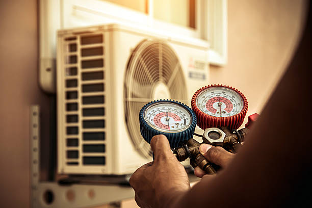 Professional Air Conditioning Service technician working in Tallulah, LA